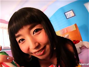 japanese star Marica Hase plays with candy prick